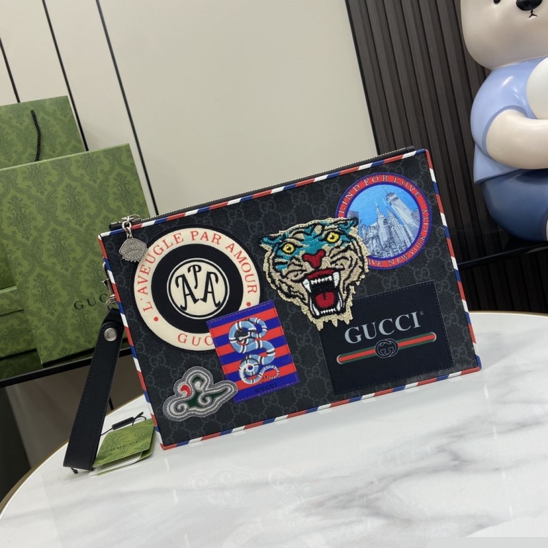 G*u*i clutch bags